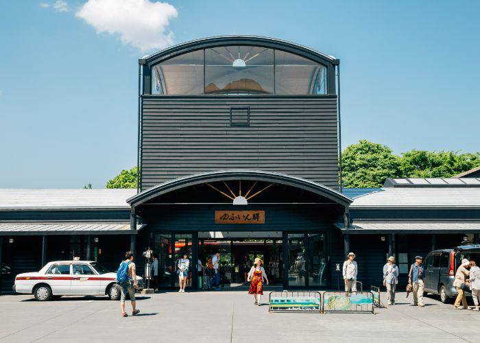 The exterior of Yufuin Station Art Hall, famous for its free art gallery and footbath.